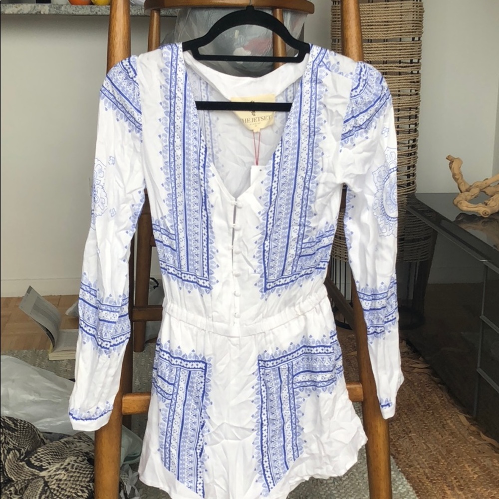 Never worn the jetset long sleeve romper